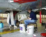 With training complete, we began to clean up and restore N9124Z.  Here, our friend Mark Merrill cleans the left wheel well  