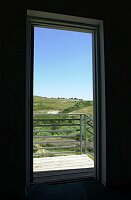 The door leading out of the room above the garage.  