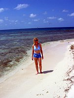Margaret on the beach in the Silk Cayes.  