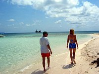 Doug and Margaret walking the beach at the Silk Cayes.  