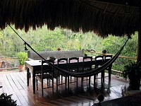 Dining table outside on the deck at the Coppola Villa, Blancaneaux.  