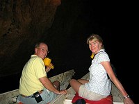 Doug and Margaret in the fronts of our canoes, with the spotlights, while caving in the Amish country of the Mountain Pine Forest Reserve, Belize.  